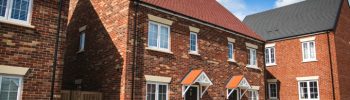 Taylor Wimpey cuts margin forecast