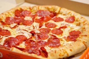 Domino’s Pizza delivered slightly better-than-feared annual revenue
