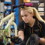 Halfords hikes profit guidance on warm weather boost